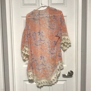 Peach and lavender floral shrug with ivory lace
